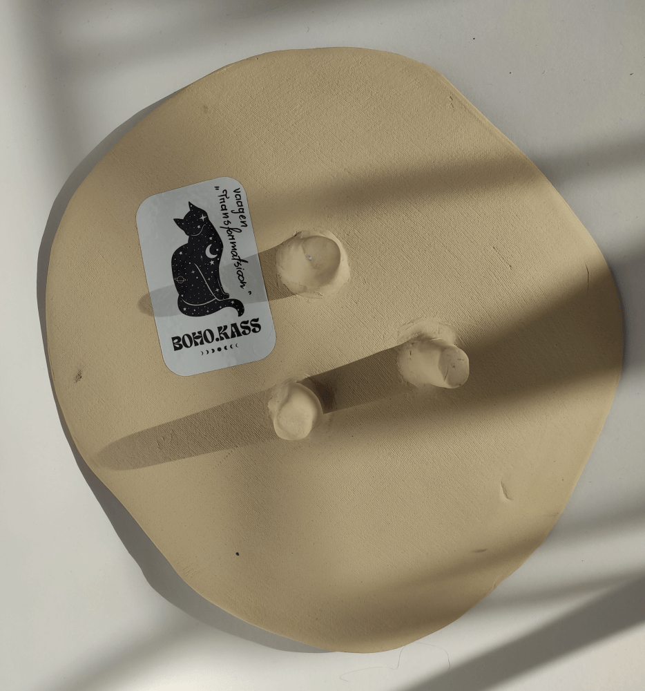 Transformation ceramic platter back view with 3 legs